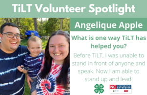 Angelique featuring her partner and son with the following text to the right of the image. TiLT Volunteer Spotlight. Angelique Apple. What is one way TiLT has helped you? Before TiLT I was unable to stand in front of anyone and speak. Now I am able to stand up and lead!