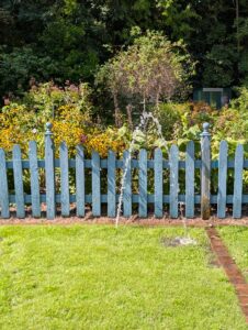 The broken spray nozzle of this sprinkler has led to a geyser of water that is damaging the turf as it comes down. Photo courtesy of Madeline Maynard